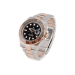 Side profile of Rolex GMT-Master II Root Beer two-tone watch showing Oystersteel and Everose gold case and bezel