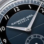 Close-up of Raymond Weil Millesime Small Seconds tuxedo sector dial with midnight blue center and light grey hour ring