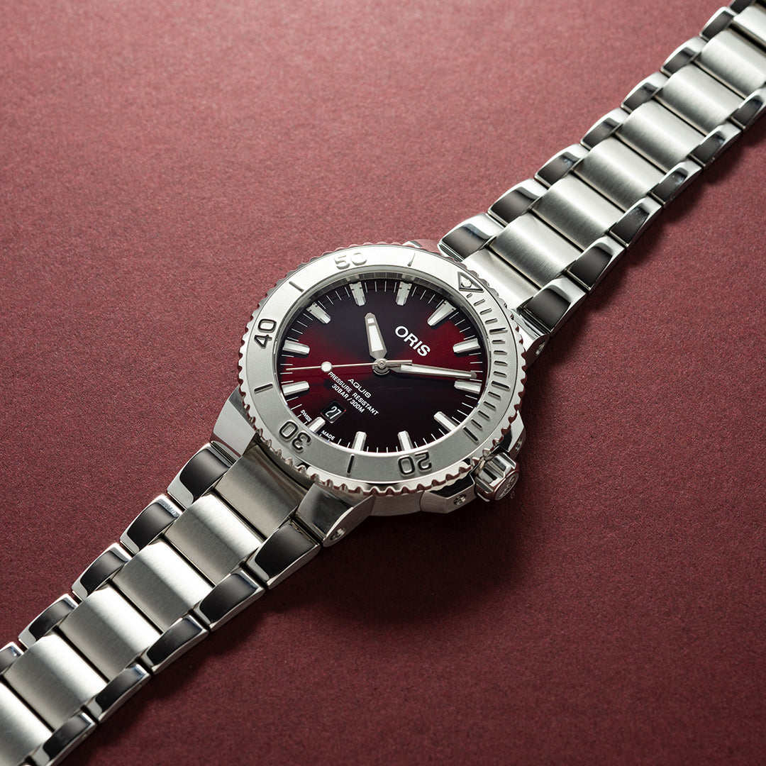 Aquis date hotsell relief oris