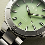 Aquis Date 36.5mm - Green Mother Of Pearl